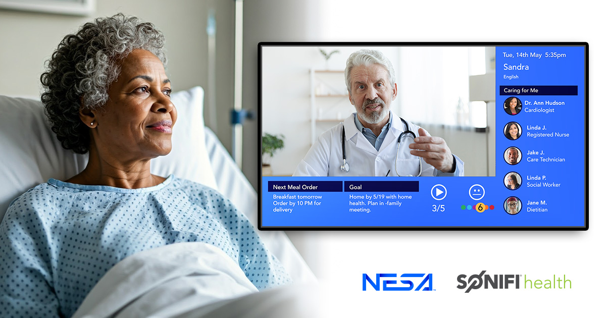 An elderly black female patient has a remote consult with her doctor using NESA's virtual care technology integrated on SONIFI Health's interactive TV